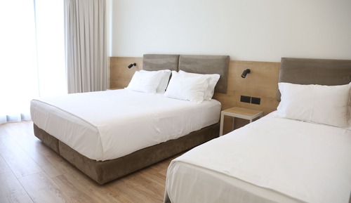 Chambre Triple, vue mer