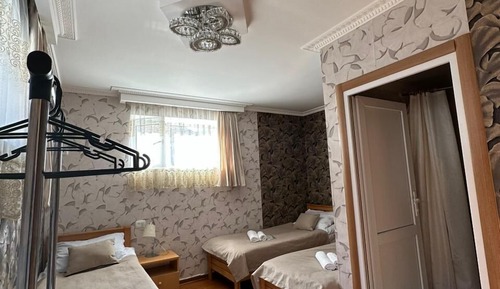 Chambre Confort, 3 lits une place