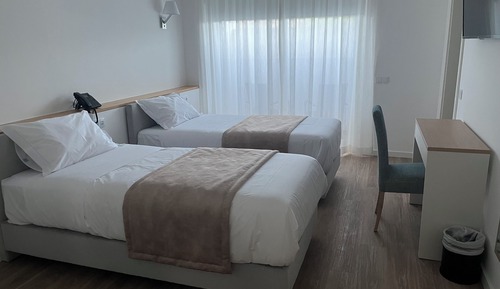 Chambre Standard avec lits jumeaux, 2 lits une place, vue jardin