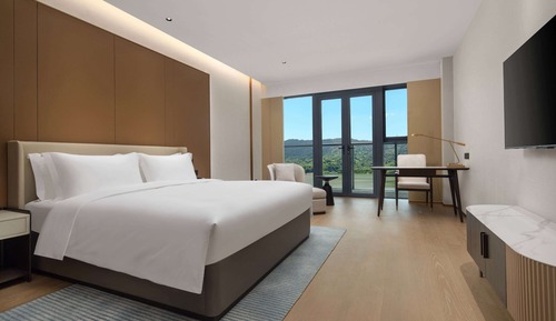 Chambre Deluxe, 1 très grand lit, non-fumeurs, vue lac