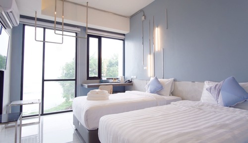 Chambre avec lits jumeaux, vue lac