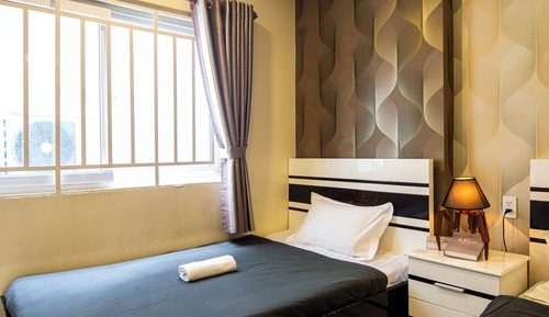 Chambre Triple Deluxe
