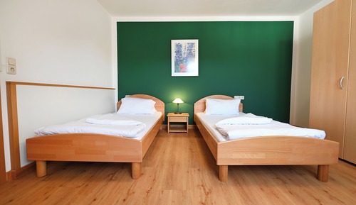 Chambre Confort avec lits jumeaux, 2 lits une place, non-fumeurs, coin cuisine