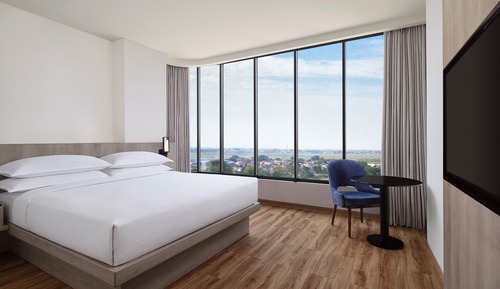 Chambre Deluxe, 1 très grand lit, vue ville, en angle