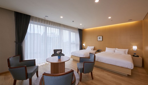 Chambre Familiale avec lits jumeaux (Premium)
