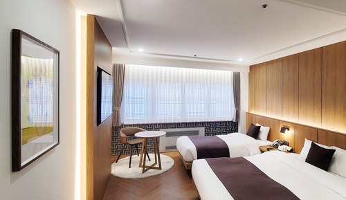 Chambre « Premier » avec lits jumeaux, vue port