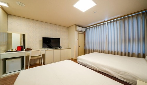 Chambre Familiale avec lits jumeaux