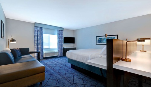 Chambre Premium, 1 très grand lit, accessible aux personnes à mobilité réduite, baignoire