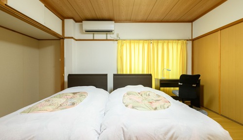 Chambre avec lits jumeaux, non-fumeurs, salle de bains commune (with Shared Bathroom)