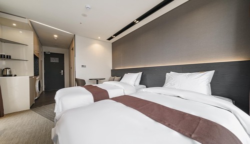 Chambre Familiale avec lits jumeaux