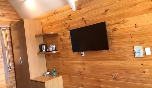 Chambre, vue jardin (Wooden Bungalow)