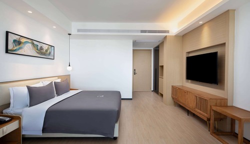 Chambre, 1 très grand lit, fumeurs