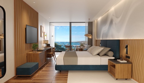 Chambre, 1 très grand lit, en front de mer