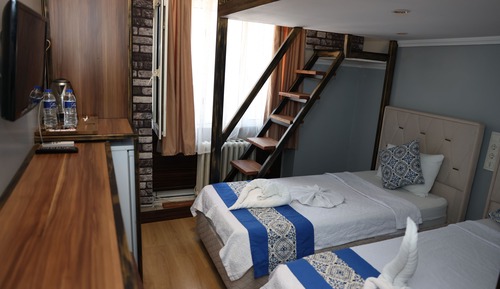 Chambre Triple Deluxe