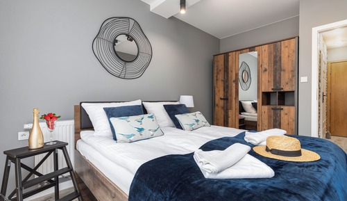Appartement Design, 1 grand lit et 1 canapé-lit