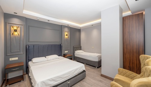 Chambre Quadruple Deluxe