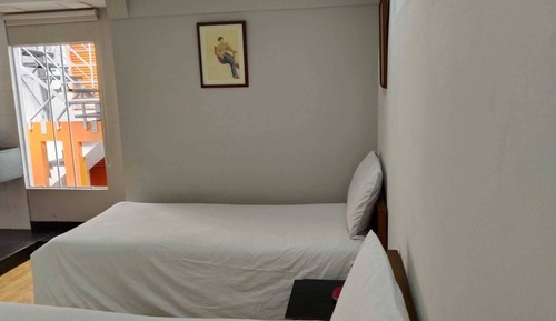 Chambre Ville avec lits jumeaux