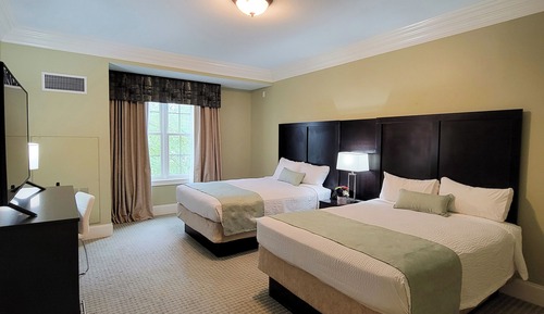 Chambre Deluxe, 2 grands lits (in the Inn)