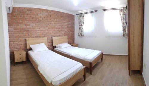 Iki Ayri Yatakli Bodrum Kat Deluxe Oda
