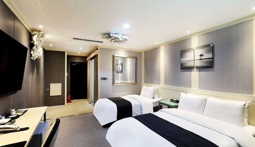 Chambre Deluxe avec lits jumeaux (Breakfast not provided on Monday)