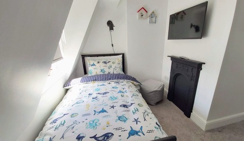 Suite Deluxe, salle de bains attenante, vue partielle sur la mer