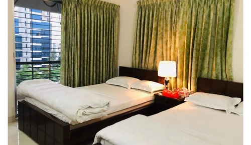 Chambre Deluxe, 2 lits une place, fumeurs, vue ville
