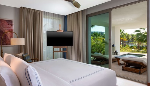 Suite, 1 très grand lit, piscine privée, vue partielle sur l'océan