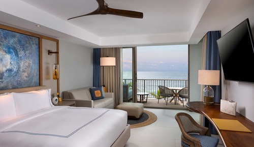 Chambre, 1 très grand lit et 1 canapé-lit, en front de mer