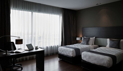 Chambre Deluxe avec lits jumeaux, 2 lits une place