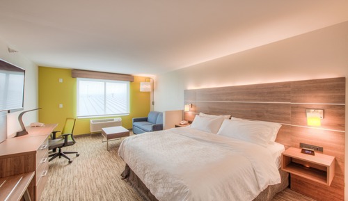 Suite, 1 très grand lit et 1 canapé-lit (Communications)