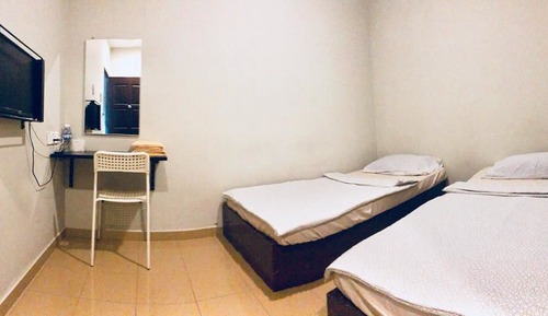 Chambre avec lits jumeaux