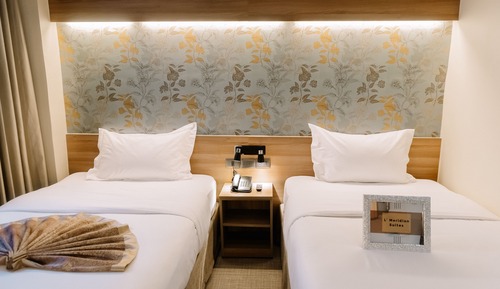 Chambre Deluxe, 2 lits une place