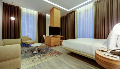 Chambre Deluxe, 1 très grand lit, en angle