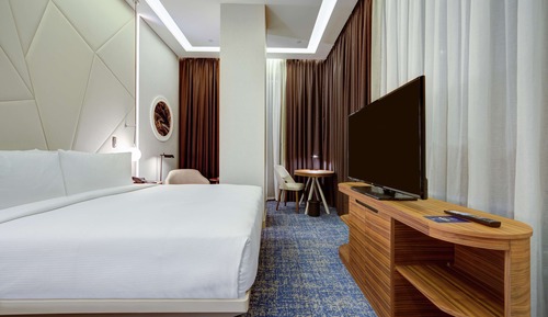 Chambre Deluxe, 1 très grand lit