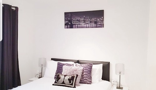 Chambre Deluxe Double ou avec lits jumeaux, salle de bains commune, vue jardin
