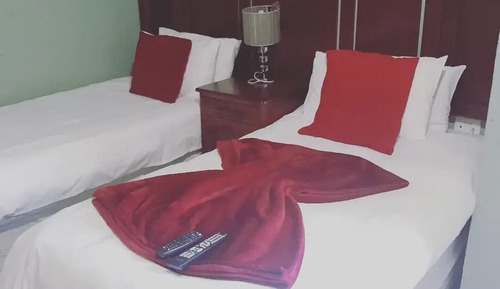 Chambre Deluxe avec lits jumeaux, 2 lits une place