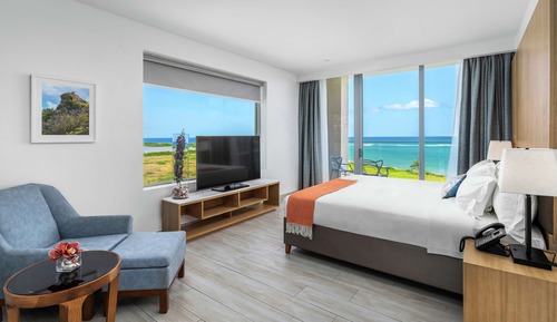 Suite, 1 très grand lit, balcon, en front de mer