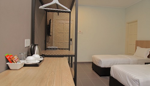Chambre Économique avec lits jumeaux, 2 lits une place, salle de bains privée