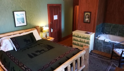 Chambre Confort, 1 grand lit, baignoire à jets
