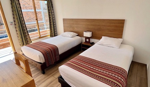 Chambre Standard avec lits jumeaux, 2 lits une place, salle de bains privée