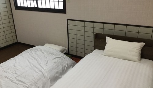 Chambre avec lits jumeaux, 2 lits une place (without bath)