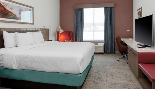 Chambre, 1 très grand lit, accessible aux personnes à mobilité réduite (Hearing)