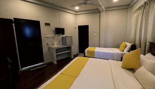 Chambre Triple Deluxe, réfrigérateur
