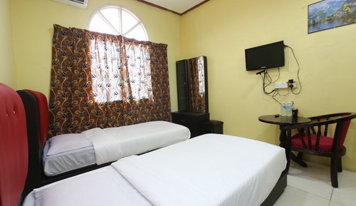 Chambre Deluxe avec lits jumeaux