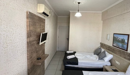 Chambre Familiale avec lits jumeaux