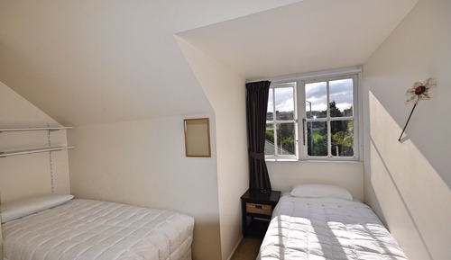 Chambre Économique avec lits jumeaux, salle de bains commune (Room 7)