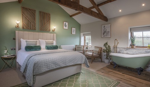 Suite Deluxe, salle de bains attenante, vue jardin (Junior Suite)