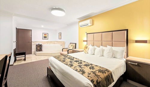 Suite Deluxe, 1 très grand lit, non-fumeurs, bain à remous