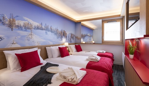 Chambre Triple (Adultes + Enfant)