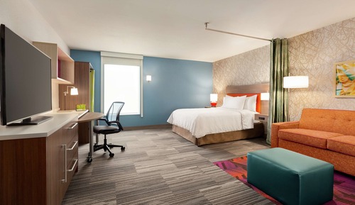 Suite, 1 grand lit, accessible aux personnes à mobilité réduite, baignoire (Mobilty/ Hearing)